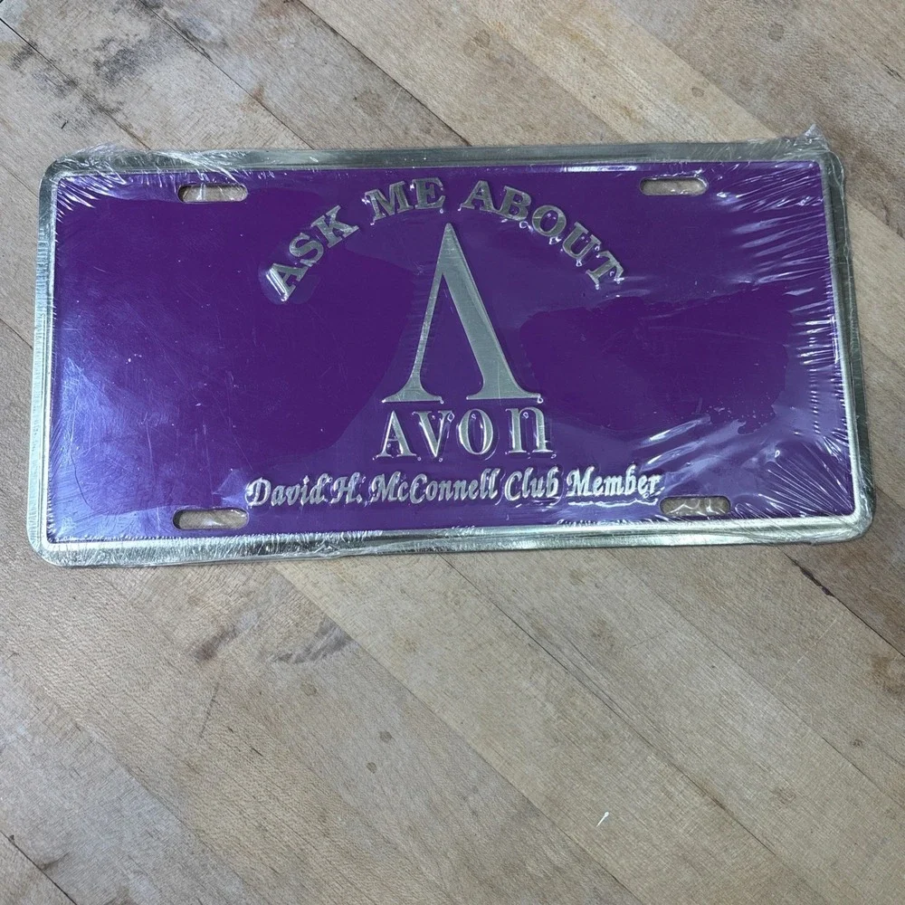 Vintage Avon Metal License Plate Purple Gold Advertising Sign NOS